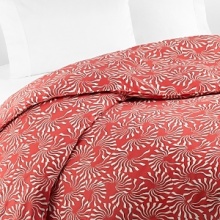 The waving undersea-style motif on a vivid coral background infuses this DIANE von FURSTENBERG full/queen duvet cover with poppy modernity. The waving undersea-style motif on a vivid coral background infuses this DIANE von FURSTENBERG full/queen duvet cover with poppy modernity.