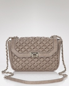 Treesje's quilted shoulder bag is an after-dark option with prim and proper appeal. Slip this leather mini over a nipped jacket to channel of-the-moment elegance. Treesje's quilted shoulder bag is an after-dark option with prim and proper appeal. Slip this leather mini over a nipped jacket to channel of-the-moment elegance.