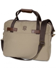 Your new on-the-go companion. This zip top bag from Tommy Hilfiger keeps your laptop, lunch and whatever else you need for the day-to-day packed up in style. Your new on-the-go companion. This zip top bag from Tommy Hilfiger keeps your laptop, lunch and whatever else you need for the day-to-day packed up in style.
