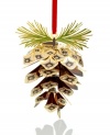 A relic of your tree's past, this pine cone ornament captures the intricacies of nature in gold-plated brass. Finished with tufted pine needles, it fits right into its surroundings.