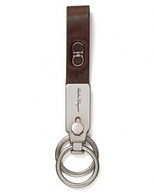 Adorned with Salvatore Ferragamo's signature Gancini logo, this keychain adds a bit of designer flair to your every day. Adorned with Salvatore Ferragamo's signature Gancini logo, this keychain adds a bit of designer flair to your every day.