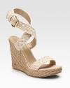 A crocheted ankle-strap design with leather details and roped, rural-inspired wedge.Roped wedge heel, 4¾ (120mm) Roped platform, 1¼ (30mm) Compares to a 3½ heel (90mm) Open toe Adjustable strap with buckle Cotton upper Leather lining Padded insole Rubber sole Made in SpainOUR FIT MODEL RECOMMENDS ordering true size.. 