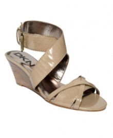 Brighten up the night. Step out in the Eleanor wedge sandals by DKNYC for patent leather shine with each stride. Brighten up the night. Step out in the Eleanor wedge sandals by DKNYC for patent leather shine with each stride.