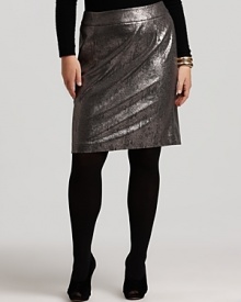 A modern interpretation of a timeless silhouette, this Calvin Klein metallic pencil skirt is dusted with a shimmering gunmetal finish for glamorous edge.