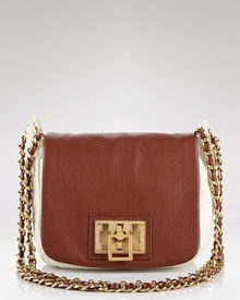 Tory Burch's leather mini bag is a proof that luxe things come in little packages. Boasting a gold tone strap and hardware, this compact shines over an all-black ensemble. Tory Burch's leather mini bag is a proof that luxe things come in little packages. Boasting a gold tone strap and hardware, this compact shines over an all-black ensemble.