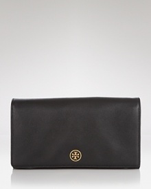 Simple, sophisticated style goes compact with this leather wallet from Tory Burch. With multiple compartments and a sleek silhouette, it's a perfectly poised purse companion. Simple, sophisticated style goes compact with this leather wallet from Tory Burch. With multiple compartments and a sleek silhouette, it's a perfectly poised purse companion.