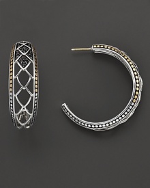 An elegant offering from John Hardy, the Naga hoop earring blends gold and silver, rendered with filigree cutout detail. Designed by John Hardy. An elegant offering from John Hardy, the Naga hoop earring blends gold and silver, rendered with filigree cutout detail. Designed by John Hardy.
