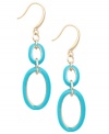 Infuse your look with a touch of the tropics. Charter Club's bright style features turquoise blue resin and gold tone mixed metal in a chic double oval drop earring. Approximate drop: 1-3/4 inches.