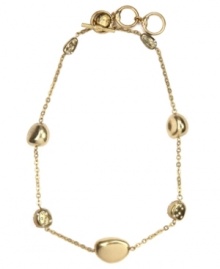 It's a gold rush! This chic necklace by Jones New York features nugget stones, some embellished with glass accents. Crafted in worn gold tone mixed metal with a toggle bar closure. Approximate length: 18 inches + 2-inch extender. It's a gold rush! This chic necklace by Jones New York features nugget stones, some embellished with glass accents. Crafted in worn gold tone mixed metal with a toggle bar closure. Approximate length: 18 inches + 2-inch extender.