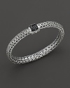 Small signature sterling woven chain bracelet with carved chain black sapphire clasp, designed by John Hardy.