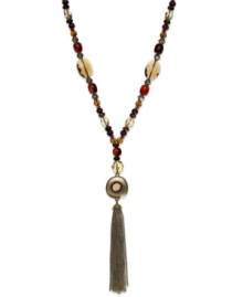 Lauren Ralph Lauren's lovely necklace features a trendy tassel design with semi-precious tiger's eye beads and glass, resin and wood accents. Approximate length: 32 inches + 2-inch extender. Approximate drop: 5-1/2 inches.