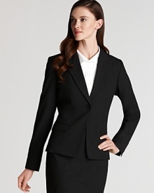 Sharp suiting takes a feminine direction with a slim silhouette and single-button closure in this Elie Tahari jacket.