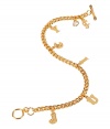 Add a stylish accent to any look with this adorable charm bracelet from Juicy Couture - Gold-tone metal chain with Juicy logo lettering, safety lock closure  - Pair with an elevated jeans-and-tee ensemble or with a mini dress for date night chic