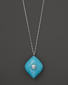 A star burst of white sapphire and sterling silver centers a turquoise pendant. By Elizabeth Showers. A star burst of white sapphire and sterling silver centers a turquoise pendant. By Elizabeth Showers.