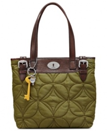 Stand out from the crowd with this chic shopper from Fossil that boasts a sleek shape and vintage-inspired detailing. Custom hardware, detail stitching and buckle accents dress the outside, while the generous interior makes it ideal for everyday demands. Stand out from the crowd with this chic shopper from Fossil that boasts a sleek shape and vintage-inspired detailing. Custom hardware, detail stitching and buckle accents dress the outside, while the generous interior makes it ideal for everyday demands.