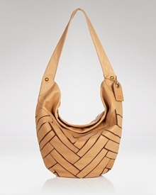 Take your casual look to the next level with UGG® Australia's suede hobo. Boasting a slingy silhouette and cool cutout details, this leather bag will lend a directional edge. Take your casual look to the next level with UGG® Australia's suede hobo. Boasting a slingy silhouette and cool cutout details, this leather bag will lend a directional edge.
