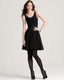 Luxe leather trims this Z Spoke Zac Posen LBD, toughening up a sweet pleated silhouette with a touch of moto glam.