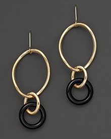 A classic with a touch of intrigue, Faraone Mennella's triple ring earrings feature 18K yellow gold with black onyx accent. Designed by Faraone Mennella.