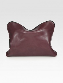 Supple leather and pebbled leather come together in a simple and portable style, perfect for all your cosmetics.Top zip closureFully lined10½W X 8H X 2½DImported Supple leather and pebbled leather come together in a simple and portable style, perfect for all your cosmetics.Top zip closureFully lined10½W X 8H X 2½DImported