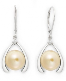 Good luck and a touch of polish. These sophisticated horseshoe-shaped earrings feature a cultured golden South Sea pearl (10-12 mm) and sparkling diamond accents. Earrings secure with a sterling silver lever backing. Approximate drop: 1 inch. Good luck and a touch of polish. These sophisticated horseshoe-shaped earrings feature a cultured golden South Sea pearl (10-12 mm) and sparkling diamond accents. Earrings secure with a sterling silver lever backing. Approximate drop: 1 inch.