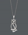 An intelligent choice. This wise style features a cut-out owl decorated with glittering, round-cut diamonds (1/10 ct. t.w.). Setting and chain crafted in sterling silver. Approximate length: 18 inches. Approximate drop: 1-1/5 inches.