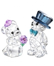 Romance is in the air for Kris Bear. A radiant bride with a violet bouquet and groom wearing a top hat and tails make this Swarovski duo a cute gift for the happy couple. Romance is in the air for Kris Bear. A radiant bride with a violet bouquet and groom wearing a top hat and tails make this Swarovski duo a cute gift for the happy couple.