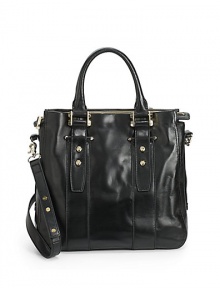 THE LOOKDouble top handlesRemovable, adjustable leather crossbody strapTop zip closureScrew head accentsProtective metal feetTwo inside open pocketsOne inside zip pocketTHE MEASUREMENTDouble top handles, 5½Crossbody strap, 15-20 drop12½W X 11½H X 5DTHE MATERIALLeatherFully linedORIGINImported THE LOOKDouble top handlesRemovable, adjustable leather crossbody strapTop zip closureScrew head accentsProtective metal feetTwo inside open pocketsOne inside zip pocketTHE MEASUREMENTDouble top handles, 5½Crossbody strap, 15-20 drop12½W X 11½H X 5DTHE MATERIALLeatherFully linedORIGINImported