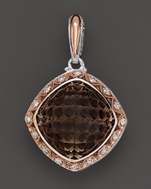 Diamonds, set in sterling silver and 18K. pink gold, frame a cushion cut smoky quartz. By Tacori.