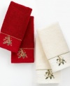 Ring in the holiday season in Lenox style. Featuring soft cotton embellished with festive holly-and-ribbon embroidery and tasteful touches of gold, these towels charm your bath with seasonal elegance. Set arrives ready to give in a Lenox box with label. (Clearance)