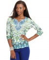 A bright print and studded embellishments make this Style&co. top a must-have for the fall!