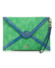 Equals parts sweet and sassy, this envelope clutch by GUESS is rocking all the right trends. A python print exterior combines with a sophisticated silhouette for the perfect night-on-the-town style. Equals parts sweet and sassy, this envelope clutch by GUESS is rocking all the right trends. A python print exterior combines with a sophisticated silhouette for the perfect night-on-the-town style.