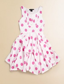 Pretty polka dots and a ruffled full skirt with pick up details will make her feel like the belle of the ball.ScoopneckSleevelessPullover styleFront bib with button detailFull skirtUneven hemCottonHand washImported Pretty polka dots and a ruffled full skirt with pick up details will make her feel like the belle of the ball.ScoopneckSleevelessPullover styleFront bib with button detailFull skirtUneven hemCottonHand washImported