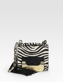 Exotic zebra-print haircalf pairs with luxe leather in this incredibly unique design, finished with a chic turnlock flap and polished chain strap.Top handle, 1 drop Shoulder strap, 12 drop Turnlock flap closure One inside zip pocket Cotton lining 6¾W X 6H X 1D Imported Exotic zebra-print haircalf pairs with luxe leather in this incredibly unique design, finished with a chic turnlock flap and polished chain strap.Top handle, 1 drop Shoulder strap, 12 drop Turnlock flap closure One inside zip pocket Cotton lining 6¾W X 6H X 1D Imported