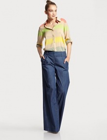 Lightweight denim in a wide, leg-lengthening silhouette tailored with a shapely contour waistband and front pleats.Wide waistband with belt loopsZip-flyPleated frontSlash pocketsBack welt pocketsRise, about 9Inseam, about 3798% cotton/2% elastaneDry cleanMade in USAModel shown is 5'10 (177cm) wearing US size 4.