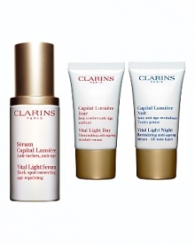 Breakthrough anti-aging formulas restore, unify and light up skin. Brilliant skin care systems powered by plants.Moisturize: Vital Light Day Illuminating Anti-Aging CreamRestores luminosity deep within the skin's surface, so it glows. Helps reduce the appearance of wrinkles and visible signs of aging. Use each morning after Vital Light Serum. FREE Travel-Size - 0.53 oz.Treat: Vital Light Serum Clarins scientific breakthrough defies dark spots, dullness and wrinkles in just 2 weeks - while visibly lifting, firming and restoring the deep luminosity of young-looking skin. Use under Vital Light Day or Night Cream. Full-Size - 1.0 oz.Repair: Vital Light Night Revitalizing Anti-Aging CreamAnti-aging night cream helps boost microcirculation, so skin awakens rosy, revitalized, glowing with good health. Use each night after Vital Light Serum. FREE Travel-Size - 0.53 oz. Breakthrough anti-aging formulas restore, unify and light up skin. Brilliant skin care systems powered by plants.Moisturize: Vital Light Day Illuminating Anti-Aging CreamRestores luminosity deep within the skin's surface, so it glows. Helps reduce the appearance of wrinkles and visible signs of aging. Use each morning after Vital Light Serum. FREE Travel-Size - 0.53 oz.Treat: Vital Light Serum Clarins scientific breakthrough defies dark spots, dullness and wrinkles in just 2 weeks - while visibly lifting, firming and restoring the deep luminosity of young-looking skin. Use under Vital Light Day or Night Cream. Full-Size - 1.0 oz.Repair: Vital Light Night Revitalizing Anti-Aging CreamAnti-aging night cream helps boost microcirculation, so skin awakens rosy, revitalized, glowing with good health. Use each night after Vital Light Serum. FREE Travel-Size - 0.53 oz.