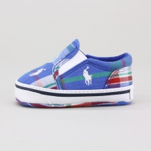 An easy slip-on silhouette is rendered in traditional plaid and embroidered with ponies for a distinctive heritage charm. An easy slip-on silhouette is rendered in traditional plaid and embroidered with ponies for a distinctive heritage charm.