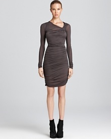 Helmut Lang's ruched dress boasts a form-fitting silhouette with flattering ruching. Helmut Lang's ruched dress boasts a form-fitting silhouette with flattering ruching.