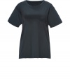 A modern basic packed with wearing possibilities, Theyskens Theorys tee is a contemporary take on this must-have staple style - Round neckline, short sleeves, dropped shoulders, slight shirttail hemline, longer back - Loosely fitted - Wear with leather leggings, booties and a slouchy satchel