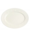 Distinguished by rich relief patterns in milky white china, the Cellini collection brings European classicism to the table. Oval platter has a braided edge and ornate floret-patterned rim. Microwave and dishwasher safe.