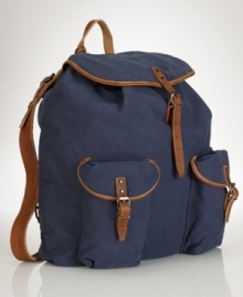 Taking a cue from vintage hiking bags, a rugged canvas backpack is accented with leather trim and multiple pockets for stylish stowing. Taking a cue from vintage hiking bags, a rugged canvas backpack is accented with leather trim and multiple pockets for stylish stowing.