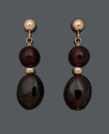 Get a double dose of style in rich, red hues. These daring drops feature two, graduated (6 mm and 6 mm x 8 mm), garnet beads (14 ct. t.w.) in a 14k gold post setting. Approximate drop: 3/4 inch. Get a double dose of style in rich, red hues. These daring drops feature two, graduated (6 mm and 6 mm x 8 mm), garnet beads (14 ct. t.w.) in a 14k gold post setting. Approximate drop: 3/4 inch.