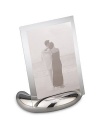 A lustrous oval base crafted from signature metal alloy holds two sheets of glass that encase a most treasured photograph, whether vertical or horizontal. Accommodates a 4 X 6 photograph Overall: 6 X 3½ X 7 Imported 
