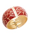 Stack your wrists with bold, vibrant styles. Charter Club's fancy bangle bracelet features a scrolling pattern in red enamel. Crafted in gold tone mixed metal. Secures with a hinge clasp. Approximate diameter: 2-1/2 inches.