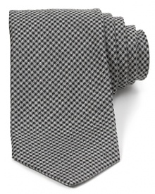 A vintage-inspired mini-check pattern gets the modern treatment with a dapper skinny-tie silhouette. A vintage-inspired mini-check pattern gets the modern treatment with a dapper skinny-tie silhouette.