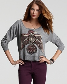 A graphic eagle rendered in a geometric pattern emboldens this cozy Lauren Moshi sweatshirt.