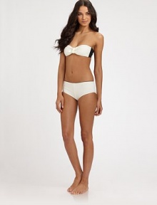 It doesn't get more flirty than a bandeau silhouette or prettier than front and back bows.Bandeau topSubtle ruchingContrast back tie closureFully lined80% polyamide/20% elastaneHand washImported of Italian fabric Please note: Bikini bottom sold separately. It doesn't get more flirty than a bandeau silhouette or prettier than front and back bows.Bandeau topSubtle ruchingContrast back tie closureFully lined80% polyamide/20% elastaneHand washImported of Italian fabric Please note: Bikini bottom sold separately.