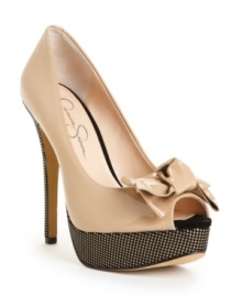 Shoes worth strutting in. The Para platform pumps by Jessica Simpson scream ooh-la-la with their sexy peep toe, bow accent and leg-lengthening height.