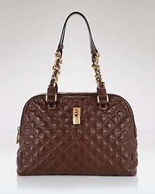 Classic quilted leather meets it's match in a structural silhouette in this ultra-chic satchel style from Marc Jacobs.