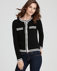 Sharp borders create a sophisticated contrast on this C by Bloomingdale's cashmere cardigan. Pair with a pencil skirt at the office for iconic chic or with downtown denim on the weekend.