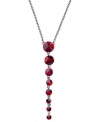 Resplendent in red. This Y-shaped necklace from GUESS is crafted from hematite-tone mixed metal with glass crystal stones adding a dazzling touch. Item comes packaged in a signature GUESS Gift Box. Approximate length: 18 inches + 2-inch extender. Approximate drop: 4 inches.